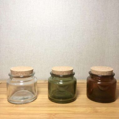 small amber glass candle jar